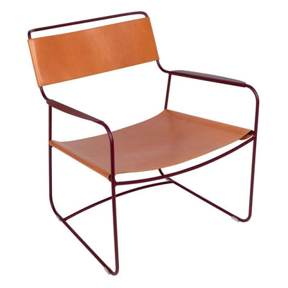 FAUTEUIL BAS CUIR SURPRISING FERMOB Cerise noire